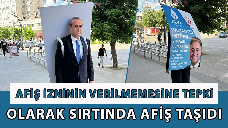 Afiş izninin verilmemesine tepki olarak sırtında afiş taşıdı