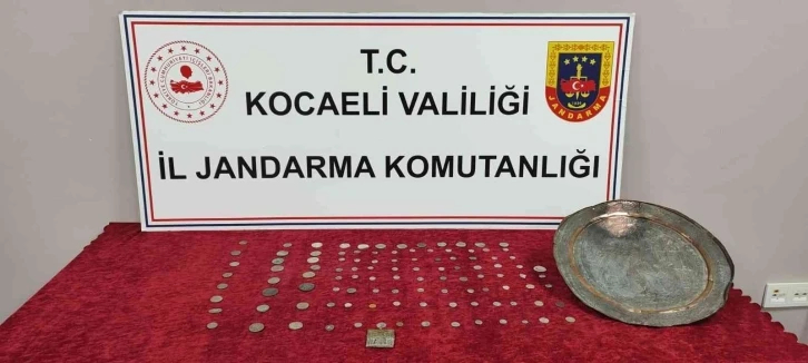 Aracında 107 sikkeyle yakalandı
