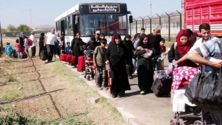 Esad rejiminden ülkeye dönen Suriyeliler için flaş karar