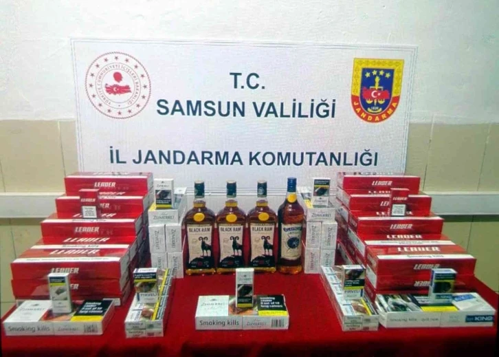 Jandarma şüpheli araçta kaçak içki ve sigara ele geçirdi
