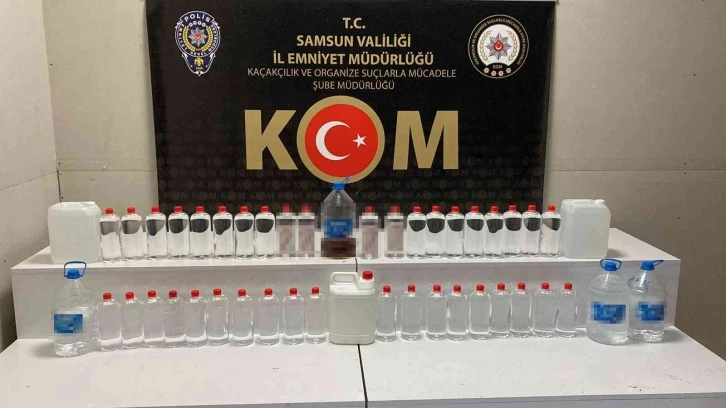 KOM polisi el yapımı içki ve etil alkol ele geçirdi
