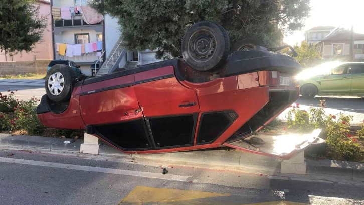 Takla atan otomobilden burnu bile kanamadan kurtuldu
