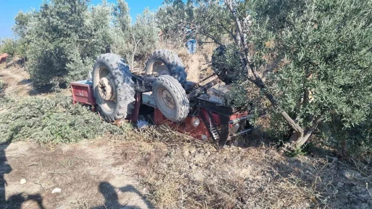 Tarlasına giderken traktörünün altında can verdi
