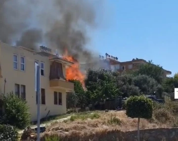 Bahçede başlayan yangın evlere sıçramadan söndürüldü
