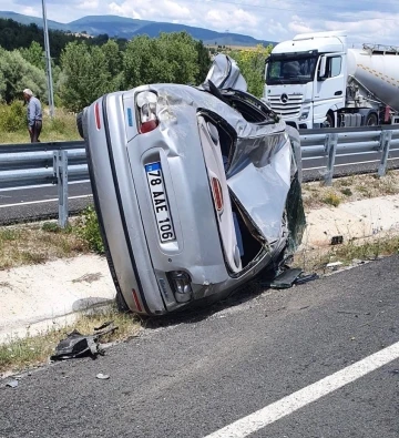 Bariyere çarpıp takla atan otomobil sürücüsü yaralandı
