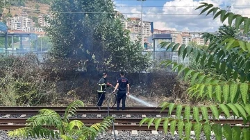 Hızlı tren rayında çıkan yangını canlarını hiçe sayarak söndürdüler
