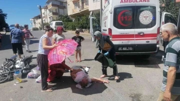 Kazada yaralanan kadına şemsiyeli koruma
