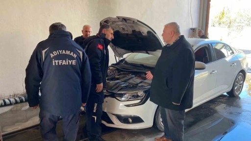 Motora sıkışan kediyi ekipler çıkardı