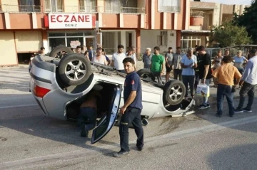 Otomobiliyle takla attı, burnu kanamadan aracından çıktı
