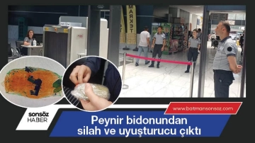 Peynir bidonundan silah ve uyuşturucu çıktı