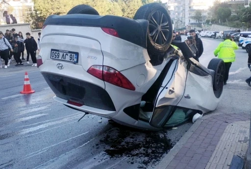 Takla atan otomobilden sağ kurtuldular
